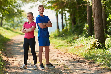 Image showing young couple preparing for a morning run