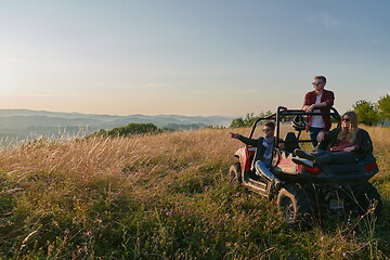 Image showing group young happy people enjoying beautiful sunny day while driving a off road buggy car