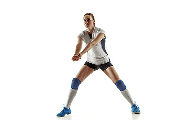 Image showing Young female volleyball player isolated on white studio background