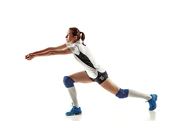 Image showing Young female volleyball player isolated on white studio background