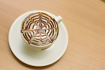 Image showing Capuccino on a cafe table