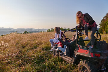 Image showing group young happy people enjoying beautiful sunny day while driving a off road buggy car