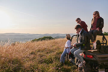 Image showing group young happy people enjoying beautiful sunny day while driving a off road buggy car