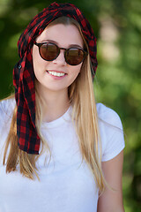 Image showing portrait of beautiful, emotional, young woman in sunglasses.