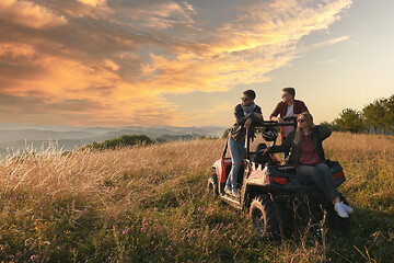 Image showing group young happy people enjoying beautiful sunny day while driving a off road buggy car