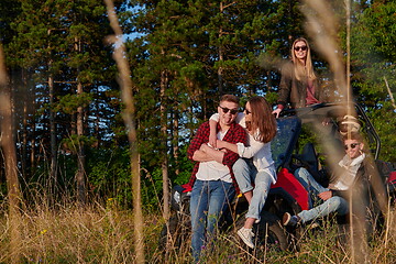 Image showing group young happy people enjoying beautiful sunny day while driving a off road buggy car