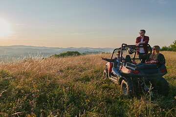 Image showing group young happy people enjoying beautiful sunny day while driving a off road buggy car