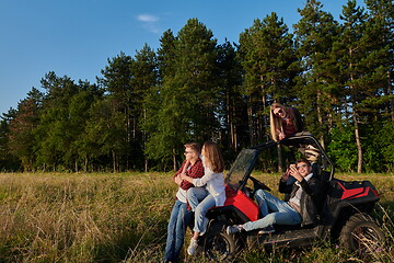 Image showing group young happy people enjoying beautiful sunny day while driving a off road buggy car