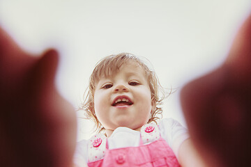 Image showing little girl spending time at backyard