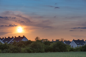 Image showing Houses and trees at sunset
