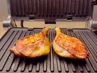 Image showing Grilled duck thighs