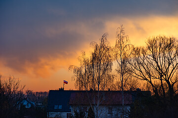 Image showing Houses and trees at sunset