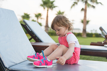 Image showing little cute girl enjoying summer vacations