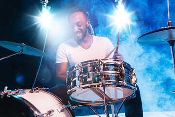 Image showing Young african-american jazz musician playing drums