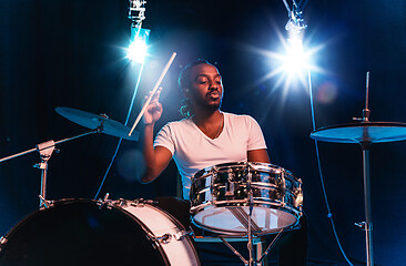 Image showing Young african-american jazz musician playing drums