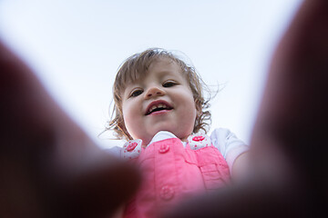 Image showing little girl spending time at backyard