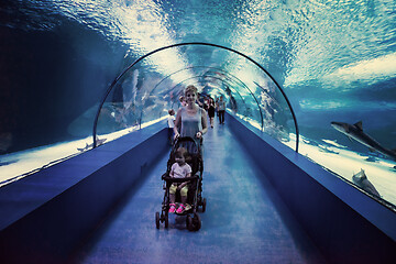 Image showing happy family  in the underwater aquarium