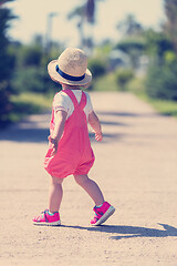 Image showing little girl runing in the summer Park