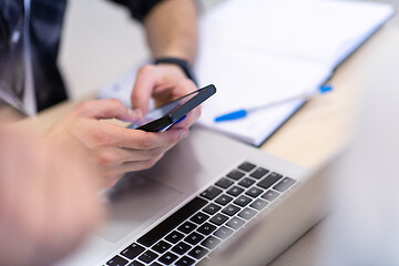 Image showing business people hands using smart phone