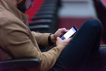 Image showing business people hands using smart phone