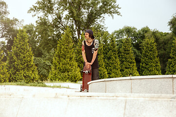 Image showing Skateboarder at the city\'s street in cloudly day