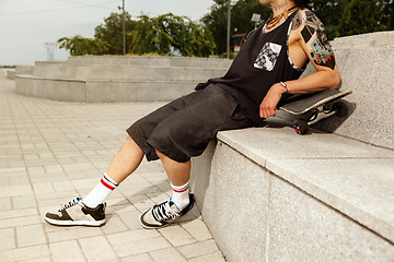 Image showing Skateboarder at the city\'s street in cloudly day