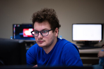 Image showing businessman working using a computer in startup office