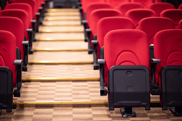 Image showing hall with rows of red seats