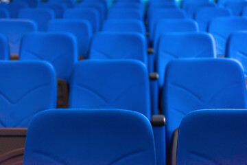 Image showing hall with rows of blue seats