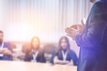 Image showing businessman giving presentations at conference room