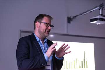 Image showing businessman giving presentations at conference room