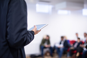 Image showing businessman giving presentations at conference room