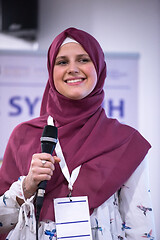 Image showing Muslim businesswoman giving presentations at conference room