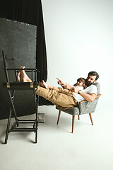 Image showing Father playing with young son in their sitting room