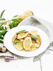 Image showing Parsnips baked in plate on white board