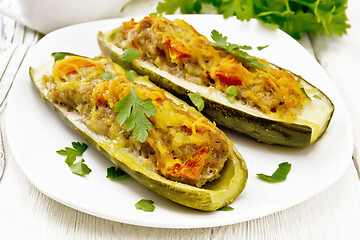 Image showing Cucumber stuffed with meat and vegetables on light board