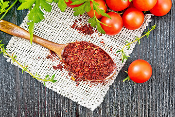 Image showing Tomatoes dried in spoon on board top