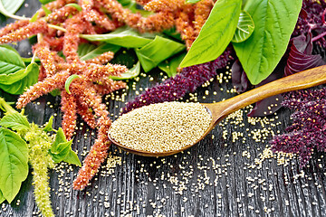 Image showing Amaranth groats in spoon on wooden board