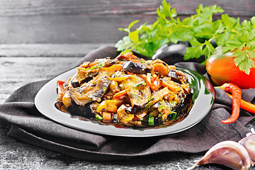 Image showing Ragout with eggplant and pepper on black board