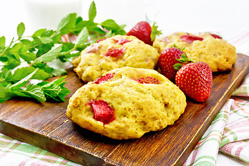 Image showing Scones with strawberry on light board