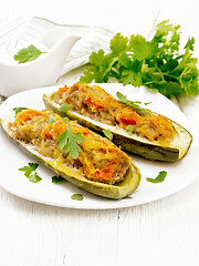 Image showing Cucumber stuffed with meat and vegetables on white board