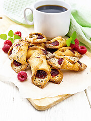 Image showing Cookies with raspberries on light board