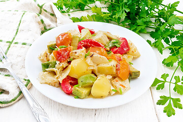 Image showing Ragout vegetable with zucchini on white board