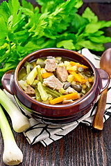 Image showing Soup Eintopf in clay bowl on table