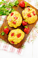 Image showing Scones with strawberry on board top