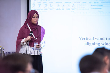 Image showing Muslim businesswoman giving presentations at conference room