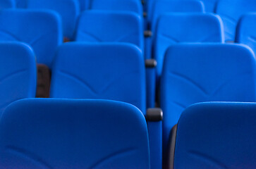 Image showing hall with rows of blue seats