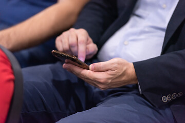 Image showing business people hands using smart phone