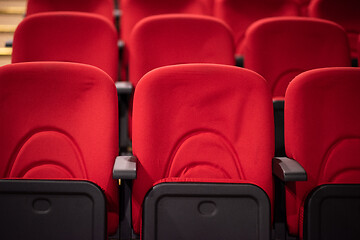 Image showing hall with rows of red seats