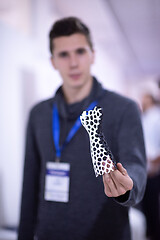 Image showing young engineer showing 3D printed model